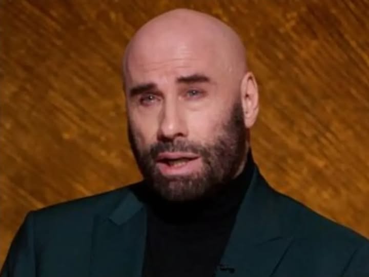 JOHN TRAVOLTA SPARKS MAJOR ANNOUNCEMENT RUMORS